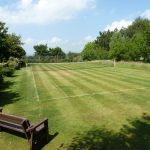 Grass Tennis court at Granary Holidays